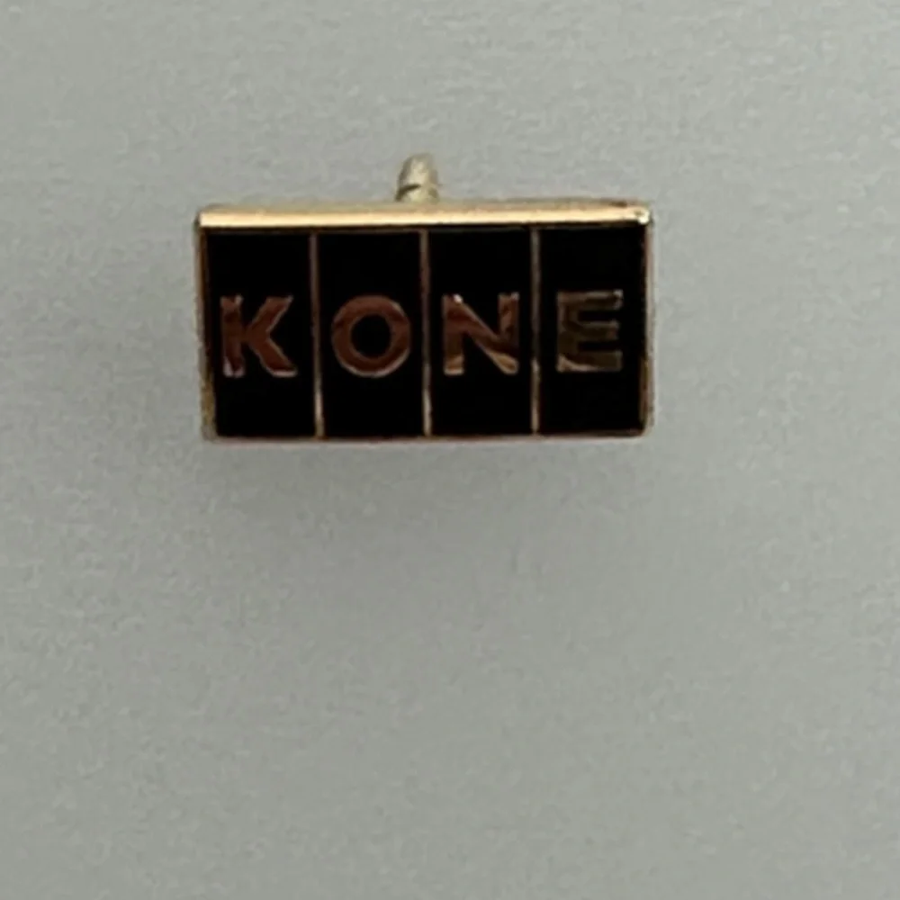 10k Gold KONE  Black and Gold Pin